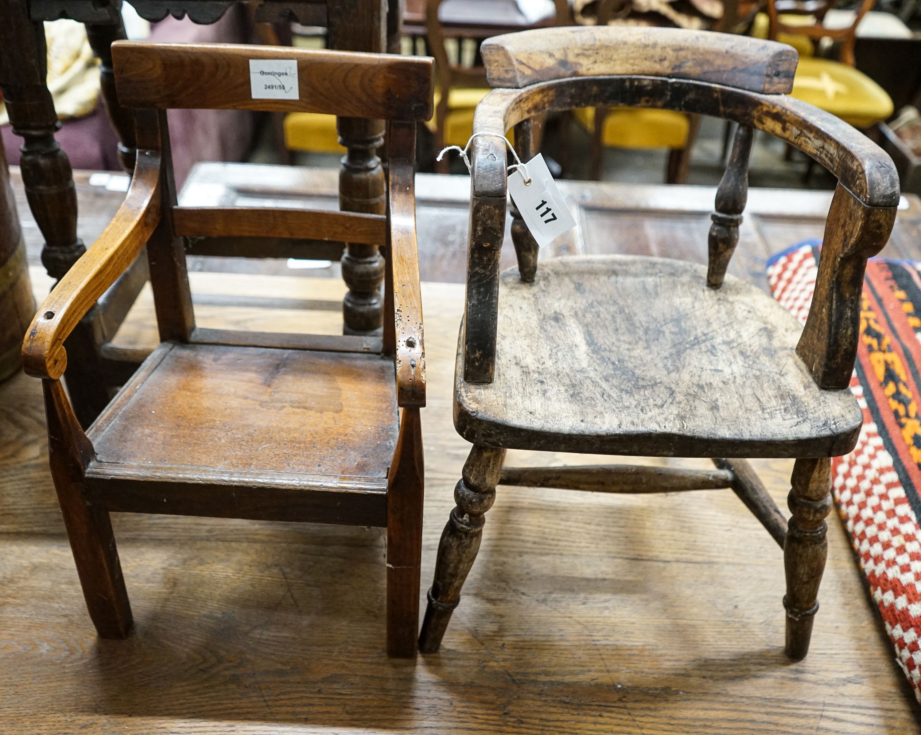 A 19th century fruitwood child's chair, larger width 30cm, height 48cm and a child's primitive tub chair